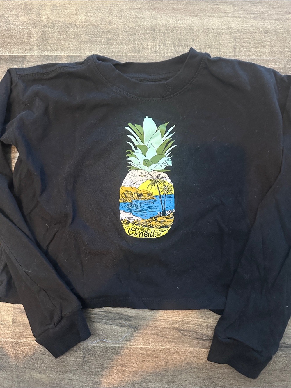 O'Neill Black Long Crop Sleeve Tee with Pineapple Beach Graphic